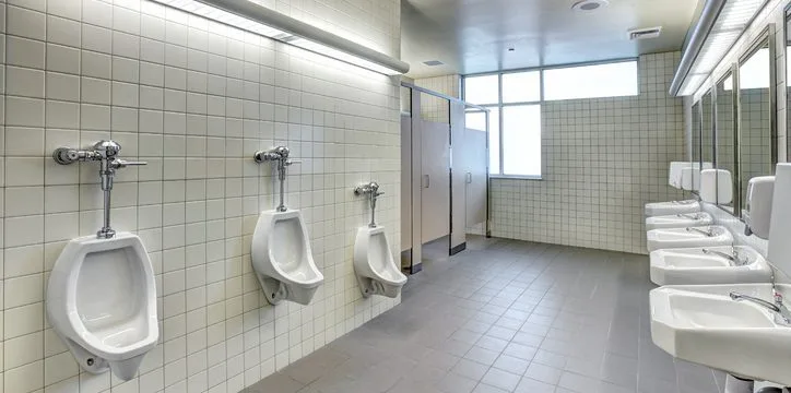 running toilet in a business restroom